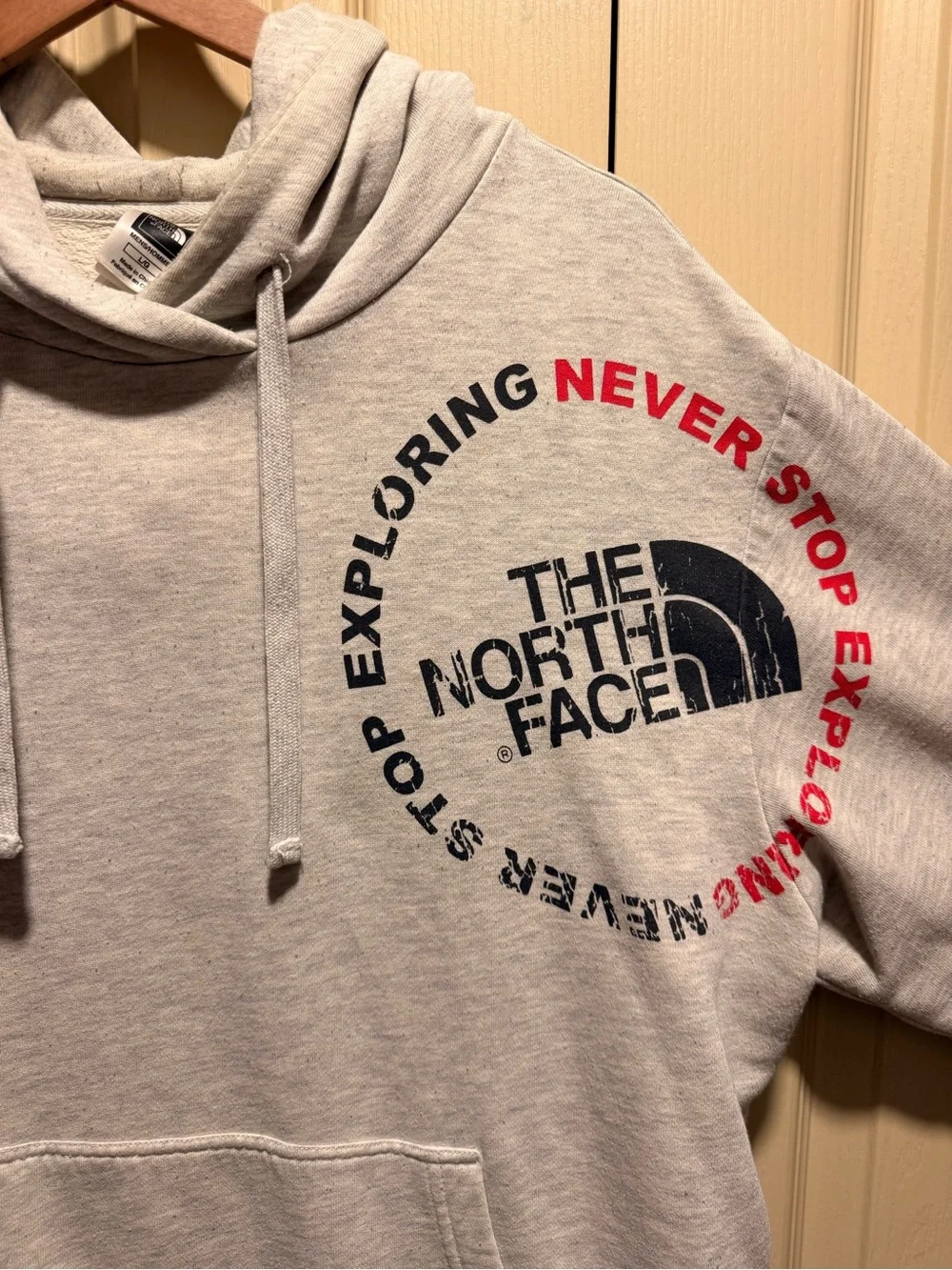 The North Face Men’s Heather Light Gray Hoodie with Black & Red Logo
